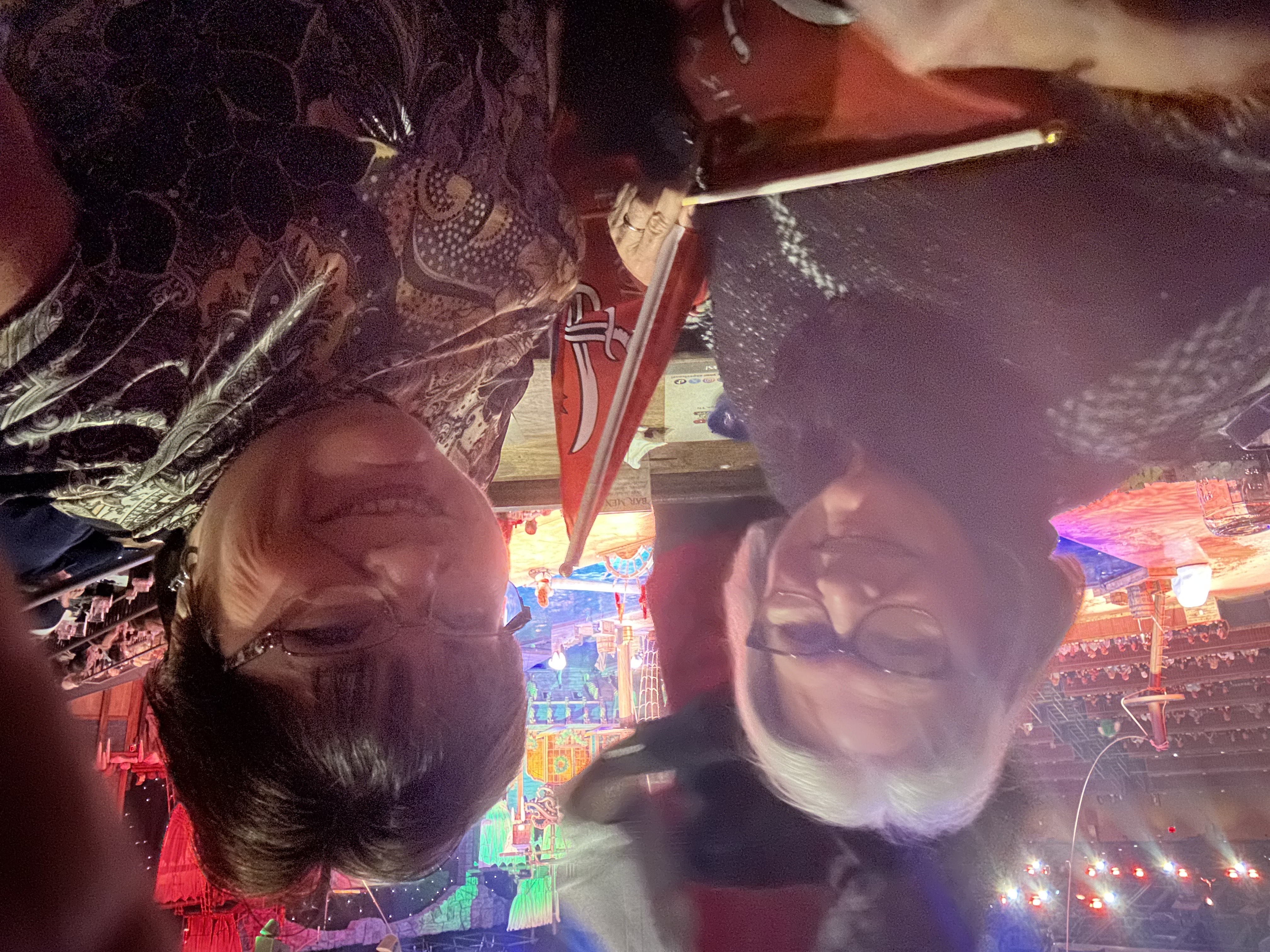 A-Team owner Pamela Turley and her sister Paula Simpson taking a photo at concert.